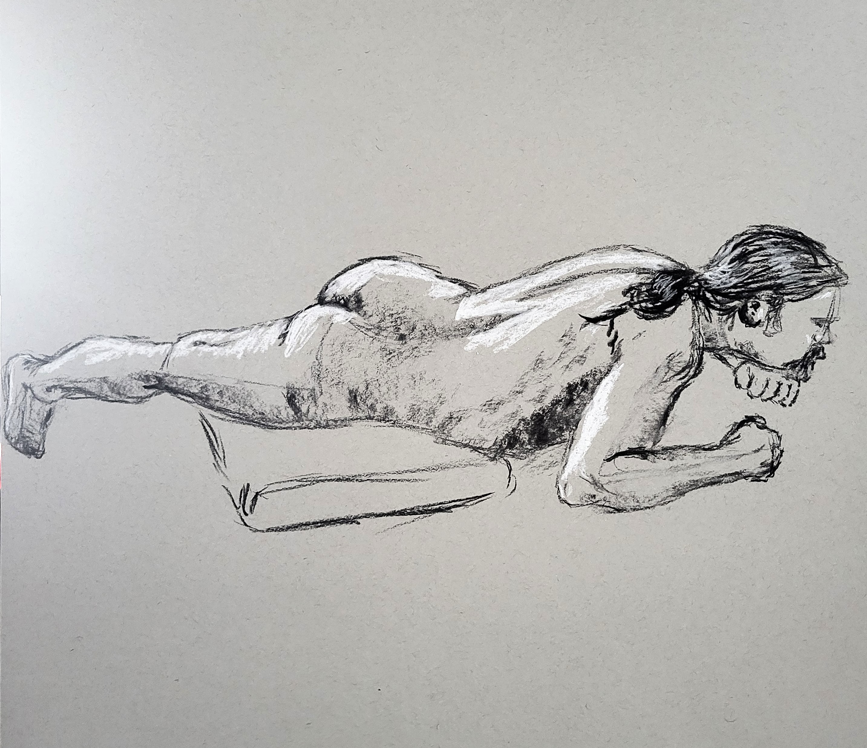 Drawing of a model lying down and propped up on one arm.